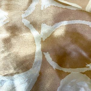 Coach C logo tan and white silk scarf.